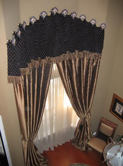 Dramatic Medallion Mounted Fringe Trim Top Treatment w Puddled Gold Draperies